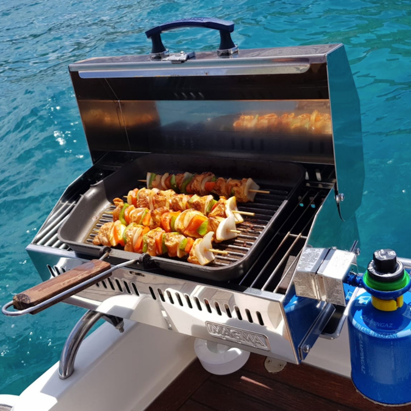 dolphin watching gran canaria - shared yacht - keeper one - blue m - barbecue grill on the yacht