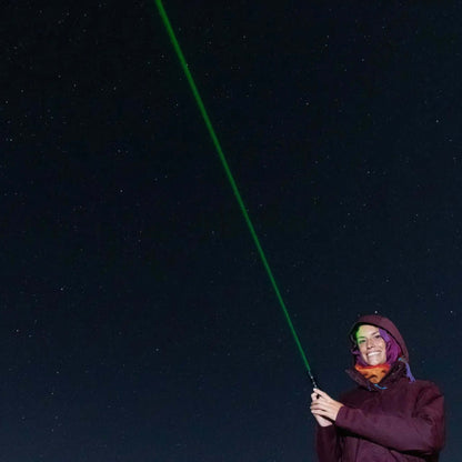 A person using a green laser pointer to guide during the Sunset & Stargazing Tour in Gran Canaria.