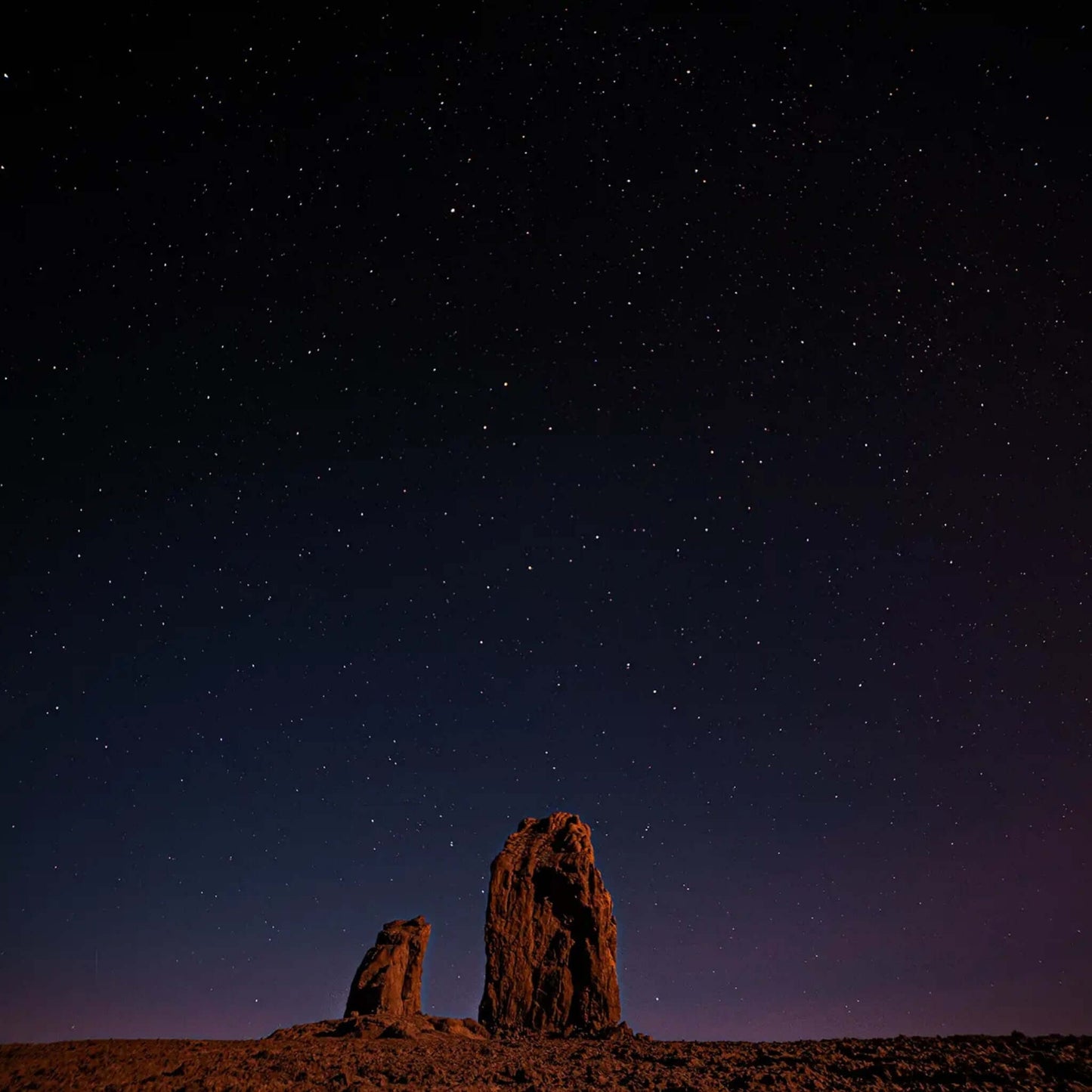 Starlit sky with rock formations during the Sunset & Stargazing Tour in Gran Canaria.