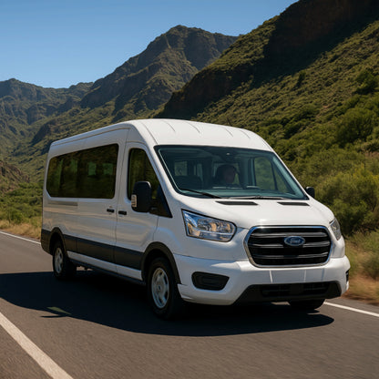 White Ford van on a mountain road