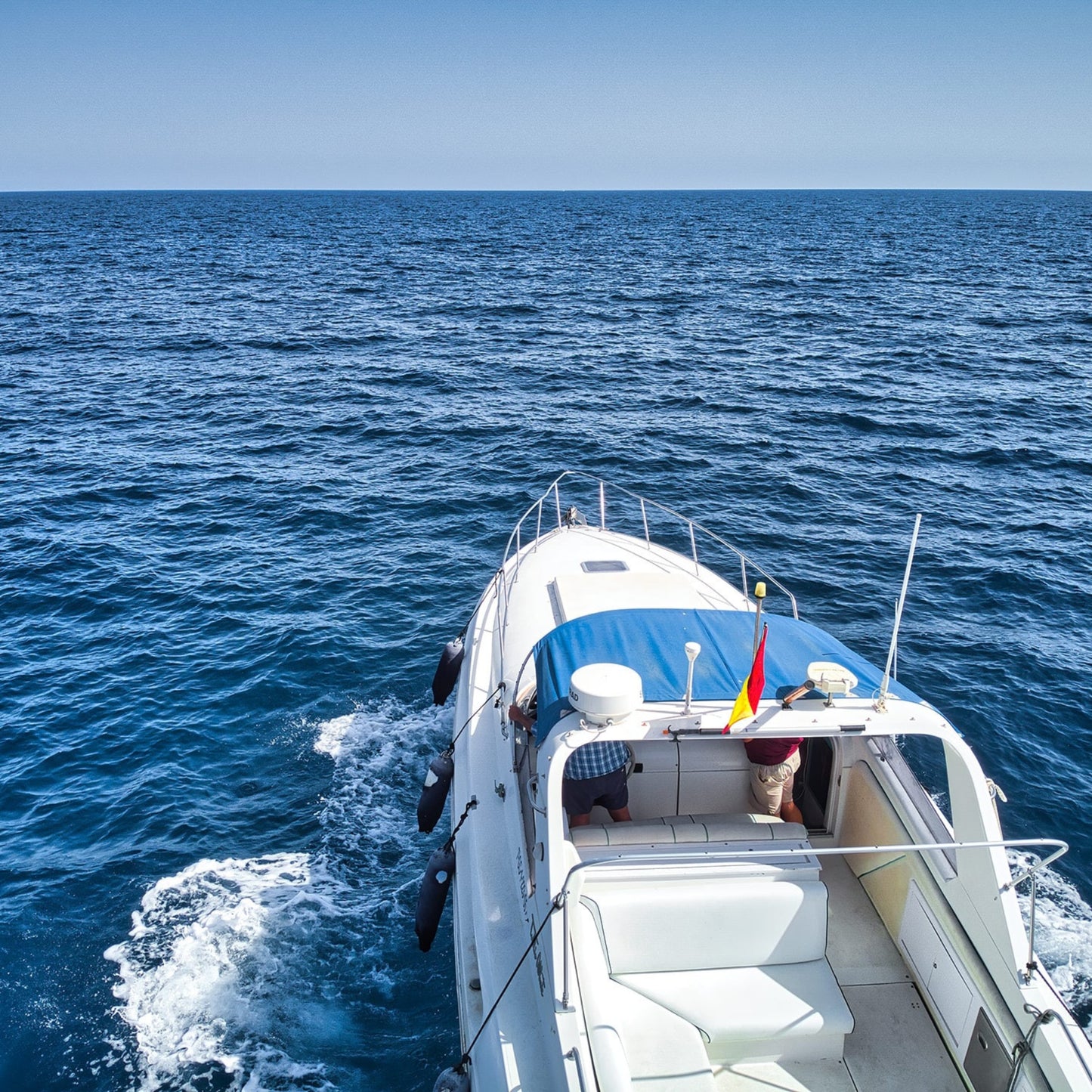 Gui Gui Yacht Tour Gran Canaria | Private & Shared Cruise on a boat sailing through the ocean.