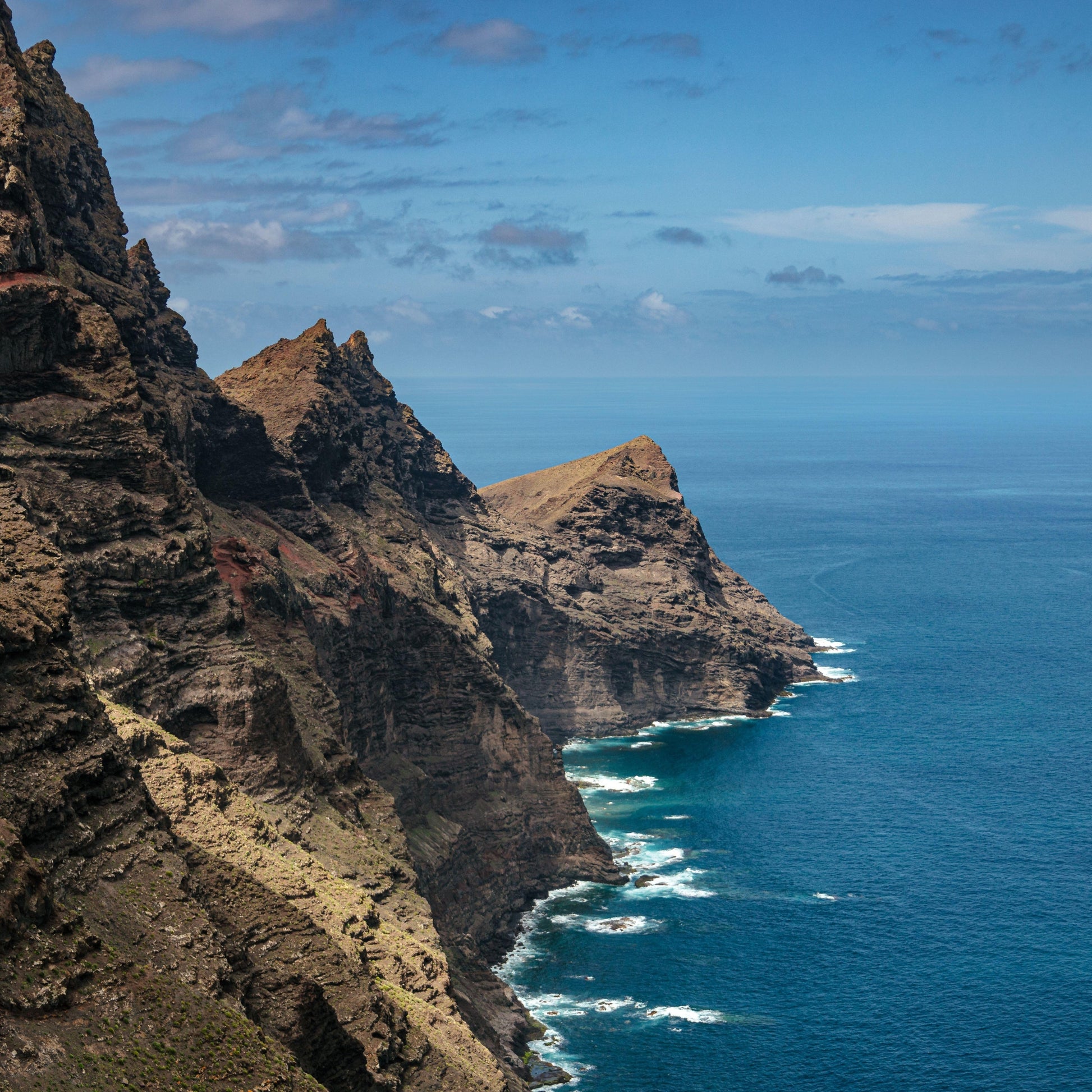 Stunning cliffs and ocean views from Gui Gui Yacht Tour Gran Canaria | Private & Shared Cruise.