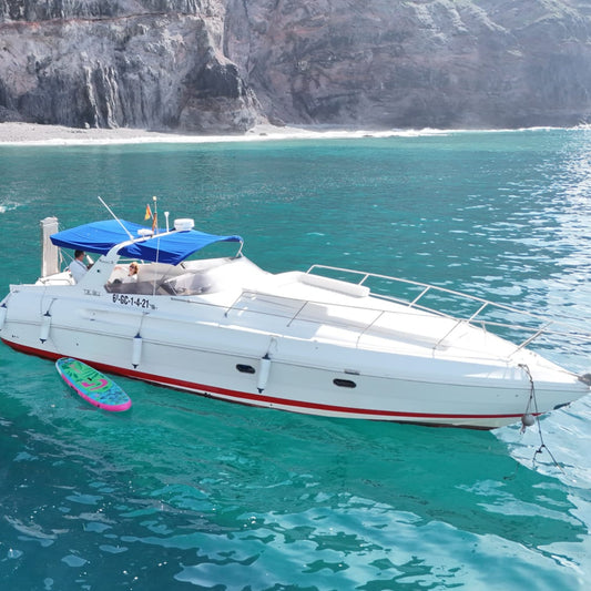 Gui Gui Yacht Tour Gran Canaria | Private & Shared Cruise - Yacht on clear waters near the coast.